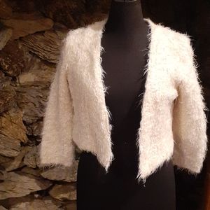 Knitted and Knotted jacket.